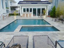 Travertine surround pool and hot tub, pool house with amenitie, set beachsides