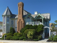 Stone Harbor Victorian style beachfront renovation features octagonal glass paneled turret
