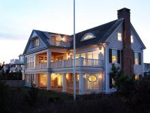 Elegant classic shake and brick chimney custom built home on South Jersey shore.