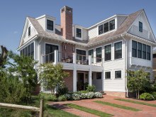 Classic style on beachfront home features ocean facing porches and brick chimney. Avalon NJ